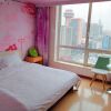 Отель Dalian Venus Apartment, фото 9