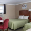 Отель Moonlight Inn and Suites, фото 4