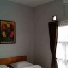 Отель Villa Fahim 2 Puncak 4 Bedroom, фото 5