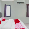 Отель OYO 91065 Guest House 19 Syariah, фото 4