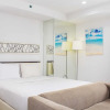 Отель Nice And Comfort Studio Room At Azalea Suites Apartment, фото 5