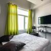 Отель Yong's Place at Vista Residences Taft, фото 4