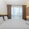 Отель Minimalist and Homey 1BR at Ciputra World 2 Apartment, фото 5