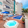Отель WIVC Casa de la Playa Condo - Literally on the Beach with Swimming Pool & Jacuzzi, фото 10