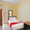 Отель OYO 91445 Sandat Guest House, фото 6
