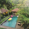 Отель The Kanjeng Suites Batubelig, фото 4