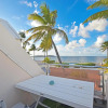 Отель Deja Blue - Comfortable Beachfront condo, фото 20