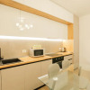 Отель Miku Apartment-Premium 2BD At Wilson Squear, фото 3