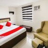 Отель OYO 393 Triangle Apartelle, фото 4