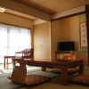 Отель Kakeyu Onsen Kutsurogi No Yado Kuroiwa Ryokan, фото 1