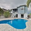 Отель Immaculate Canal W/ Pool, Dock & Game Lounge 4 Bedroom Home в Аполло Бич