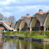 Отель Stylish thatched villa with 2 bathrooms in a holiday park near Giethoorn, фото 21