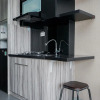 Отель Modern And Homey Studio At Bintaro Icon Apartment, фото 7
