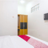 Отель OYO 617 Sukaraja Residence Syariah, фото 7
