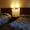 Отель Westward Inn & Suites, фото 4