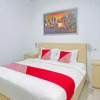 Отель OYO 90404 Pringombo Homestay 2 Syariah, фото 2
