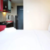 Отель Strategic And Cozy Living Studio At Tamansari Papilio Apartment, фото 1