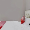 Отель OYO 92456 Putri Homestay Syariah, фото 6