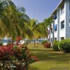 Отель Carib Beach Apartments, фото 5