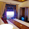 Отель Mekong Holiday Villa by Xandria Hotel Отель Mekong Holiday Villa by Xandria Hotel в Луангпхабанге