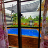 Отель Serene 2BR Escape Poolside Bliss, фото 12