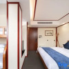 Отель Xiqiao Night Language River View Homestay (Phoenix Ancient City Lijiang Branch), фото 4