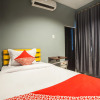 Отель OYO 990 Stadion Residence Syariah, фото 3