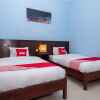 Отель OYO 2450 Hening Homestay Near Pantai Tanjung Bias, фото 12