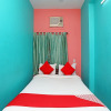 Отель OYO 16600 Ken Guest House 2, фото 19