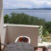 Отель Apartment Niko - 50 m from pebble beach: A5 Prizemlje Pisak, Riviera Omis, фото 11