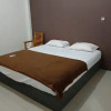 Отель OYO 92243 Fanilly Guest House Marabahan, фото 11