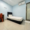 Отель OYO 90621 Stutong Stay, фото 18