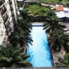 Отель Pool View 2BR Mutiara Bekasi Apartment By Travelio в Бекаси