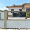 Отель OYO Home 90448 Nurbayu Guest House, фото 1