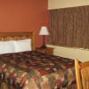 Отель The Pinecone Inn & Suites, фото 2