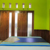 Отель SPOT ON 2490 Griya Kencana Homestay, фото 16