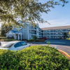Отель HomeTowne Studios by Red Roof Orlando South, фото 11
