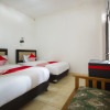 Отель OYO 3126 Penginapan Suka Asih, фото 4
