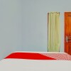 Отель OYO 90604 Menara Sakti Syariah Homestay, фото 14