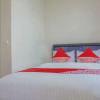 Отель Oyo 390 77 Guesthouse, фото 6