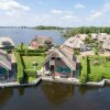 Отель Stylish Thatched Villa with 2 Bathrooms near Giethoorn, фото 19