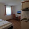 Отель Mikro Apartments Erding в Эрдинге