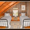 Отель Logged Inn - 3 Br cabin by RedAwning, фото 6
