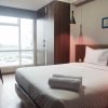 Отель Classy 1BR Apartment with Pool View at Grand Sungkono Lagoon, фото 6