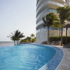 Отель Beautiful Beachfront Apartments, фото 18
