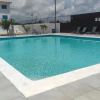 Отель Gated community with 24/7 security pool fast WiFi, фото 23
