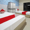 Отель OYO 91202 Family Guest House Syariah, фото 4