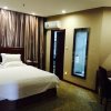 Отель GreenTree Inn Henan Puyang Pushang Huanghe Road Bu, фото 6