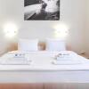 Гостиница Rosa Ski Inn Apartments Rosa Khutor в Красной Поляне