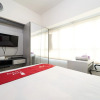 Отель RedLiving Apartemen Springlake Summarecon - Happy Rooms with Netflix, фото 12